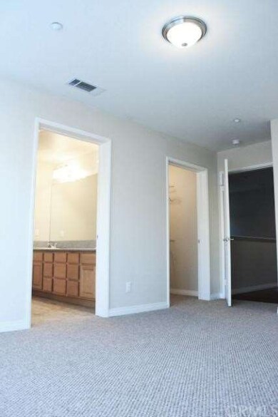 2nd master suite upstairs with walk-in closet.
