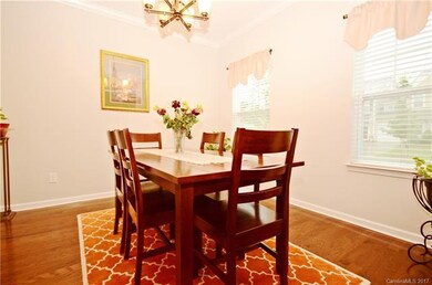 Formal Dinning with Elegant Wood Floors,
