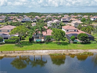 Aerial view of residential area with a nearby body of water