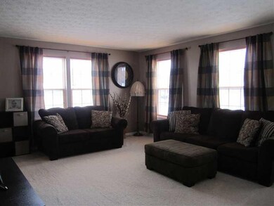 Living Room. Warm rich colors make this a very rel