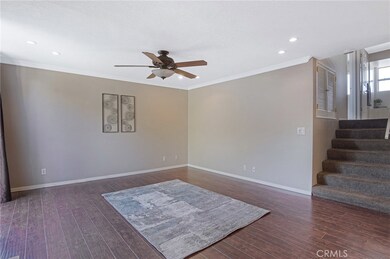 Living room with view to upstairs bedrooms and bathrooms.