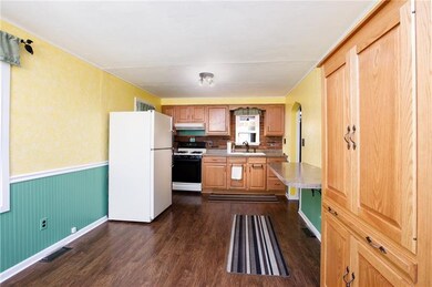 Eat-in kitchen with custom cabinetry