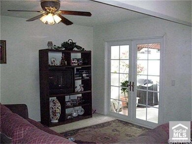 Lovely French doors to patio.  The fireplace is ju