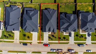 This home sits on a large lot with ample yard space in front and the back, lush landscaping and a well-maintained yard.