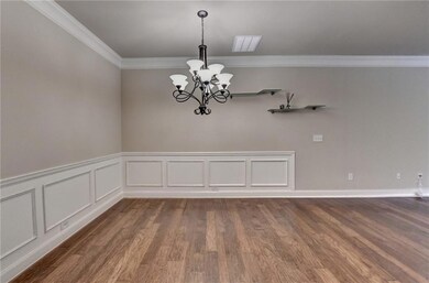 Unfurnished room featuring dark wood finished floo