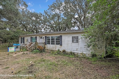 28470 Soaring Hawk Ln, Brooksville, FL 34602 - photo 2