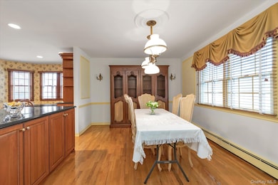 Dining Room featuring  light wood-style flooring, and recessed lighting