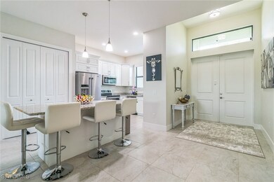 Kitchen with appliances with stainless steel finis