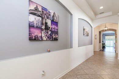 Entrance hallway with architectural features.