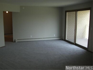 Gracious living room w/slider to covered porch. Ne