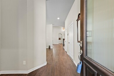 Welcome to a bright, inviting entryway featuring h
