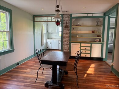 Dining space featuring healthy amount of natural l