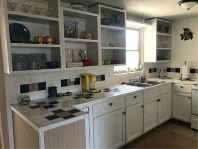 Charm abounds in this bright and cheerful kitchen