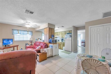 Open floor plan, tiled flooring