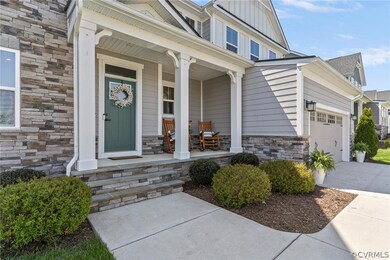 Stacked stone stairs lead you to your covered fron