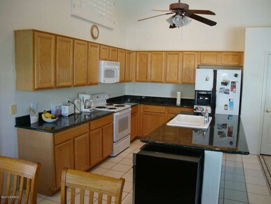 Large kitchen has granite countertops