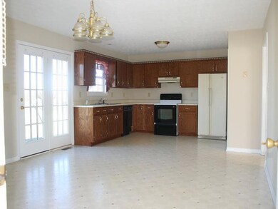 15x24 sqft kitchen dining combination. French doors lead to outside patio.