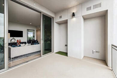 Private balcony opens to living room. Features a p