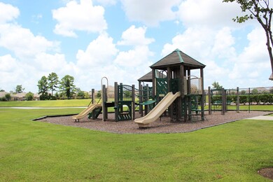 Alongside 1 of the 4 lakes in the neighborhood, the playground provides a variety of activities and a serene environment for the entire family.