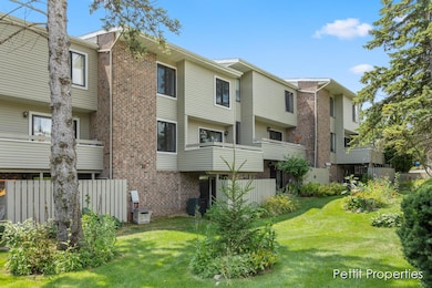 2984 Chapshire Dr SE unit 59, Grand Rapids, MI 49546 - photo 2