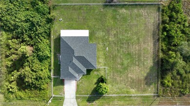 Extra full quarter acre lot fenced.