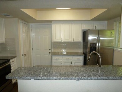 Kitchen featuring appliances with stainless steel