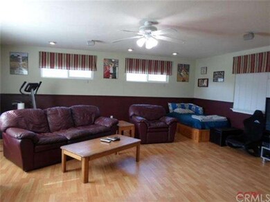 Originally a garage, this 21 x 23' game room was c