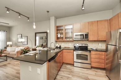 Photos are not of actual units, similar floor plan finishes