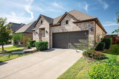 French country style house featuring a front yard 