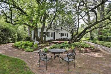 Stunning setting with brick patios & walkways