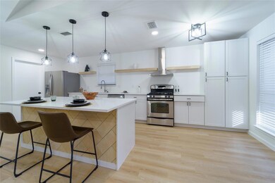 Kitchen with a wealth of natural light, stainless 
