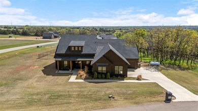 Craftsman house featuring a shingled roof, concret