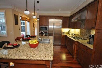 Kitchen features built-in refridgerator and upgrad