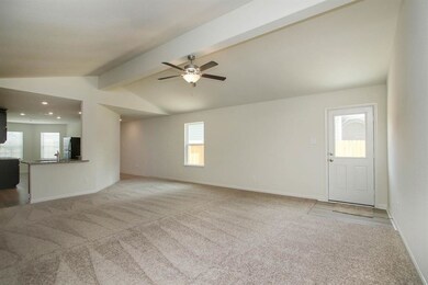 The huge living room offers plenty of space for your sectional sofa, media cabinet, coffee tables and more!