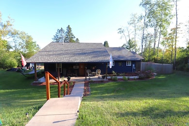 View of front of house featuring a grand covered f
