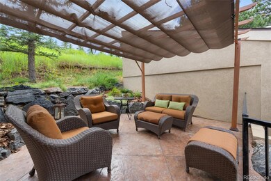 Front Patio w/ Gazebo and Rock Wall