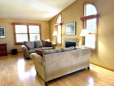 Updated Marvin windows and vaulted ceilings in the living room.