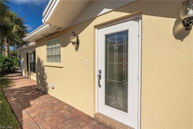 Leaded Glass Entry door flanked by new Sidelights