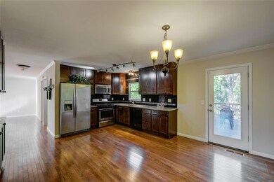 Kitchen with 42 in cabinets and lots of them.  Gra