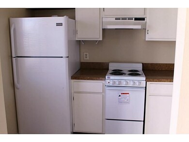 Kitchen. New refrigerator and stove convey with condo.