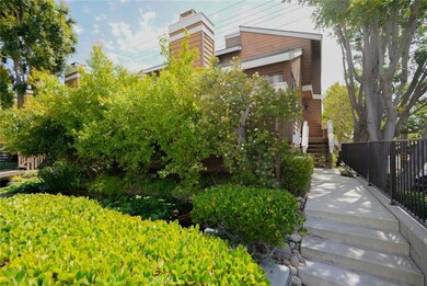 FRONT ELEVATION LEADING TO ENTRY.