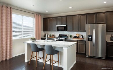 Photos are a Builder home of same floorplan