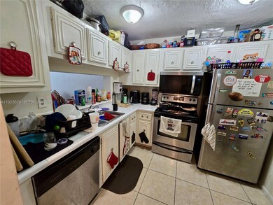 498 NW 165th St unit D-405, Miami, FL 33169 - photo 2