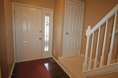 Foyer with hardwood flooring