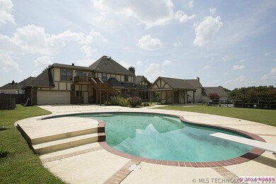 Backyard Oasis complete with diving pool, waterfal