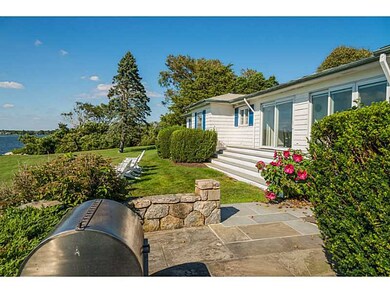 Patio/Deck. Stone walls and patios enhance the ent