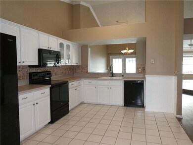 Large kitchen with breakfast nook and pantry featu