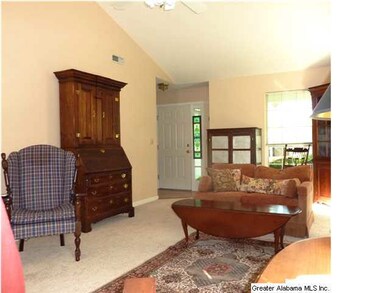 The living room, toward the front door.