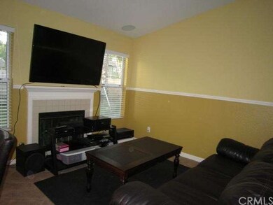 Living Room with Fireplace and Cathedral Ceilings