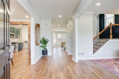 This listing features a spacious layout, hardwood 